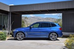Picture of a 2019 BMW X3 M40i in Phytonic Blue Metallic from a side perspective