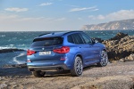 Picture of a 2019 BMW X3 M40i in Phytonic Blue Metallic from a rear right three-quarter perspective