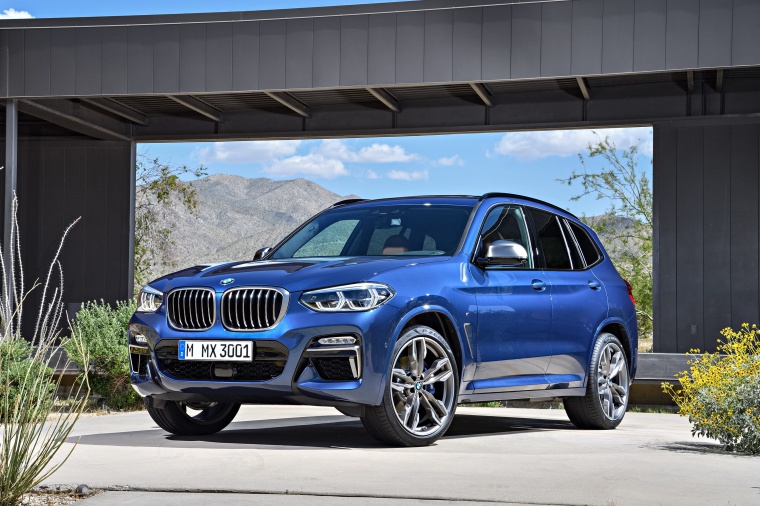 Picture of a 2020 BMW X3 M40i in Phytonic Blue Metallic from a front left three-quarter perspective