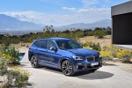 Picture of a 2020 BMW X3 M40i in Phytonic Blue Metallic from a front right three-quarter perspective