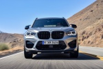 Picture of a driving 2020 BMW X3 M Competition in Donington Gray Metallic from a frontal perspective