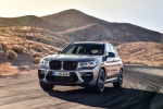 Picture of a driving 2020 BMW X3 M Competition in Donington Gray Metallic from a front left perspective