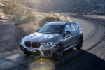 Picture of a driving 2020 BMW X3 M Competition in Donington Gray Metallic from a front left three-quarter perspective