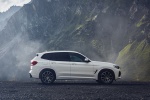 Picture of a 2020 BMW X3 xDrive30e PHEV AWD in Alpine White from a side perspective