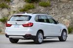 Picture of a 2017 BMW X5 xDrive50i in Alpine White from a rear right three-quarter perspective