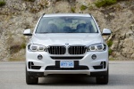 Picture of a 2017 BMW X5 xDrive50i in Alpine White from a frontal perspective