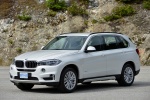 Picture of a 2017 BMW X5 xDrive50i in Alpine White from a front left three-quarter perspective