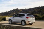 Picture of a 2019 Buick Envision AWD in Galaxy Silver Metallic from a rear left three-quarter perspective