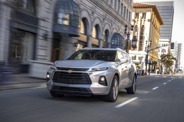 Picture of a driving 2019 Chevrolet Blazer Premier AWD in Silver Ice Metallic from a front left perspective
