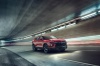 Picture of a driving 2019 Chevrolet Blazer RS AWD in Red Hot from a front right perspective