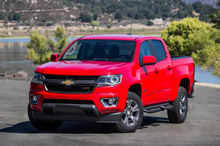 Picture of a 2015 Chevrolet Colorado Crew Cab in Red Hot from a front left perspective