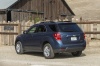 Picture of a 2016 Chevrolet Equinox LT in Blue Velvet Metallic from a rear left three-quarter perspective