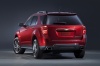 Picture of a 2016 Chevrolet Equinox LTZ in Siren Red Tintcoat from a rear left perspective