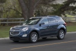 Picture of a driving 2017 Chevrolet Equinox LT in Blue Velvet Metallic from a front left three-quarter perspective