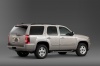 Picture of a 2014 Chevrolet Tahoe LTZ in Champagne Silver Metallic from a rear right three-quarter perspective