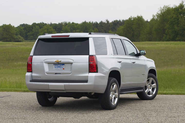 Picture of a 2015 Chevrolet Tahoe in Silver Ice Metallic from a rear right perspective