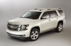 Picture of a 2015 Chevrolet Tahoe in Summit White from a front left three-quarter perspective