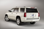 Picture of a 2015 Chevrolet Tahoe in Summit White from a rear left perspective