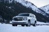 Picture of a 2016 Chevrolet Tahoe in Summit White from a front left perspective