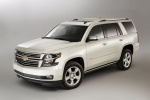 Picture of a 2016 Chevrolet Tahoe in Summit White from a front left three-quarter perspective