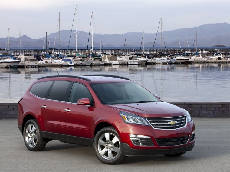 Picture of a 2014 Chevrolet Traverse LTZ AWD in Crystal Red Tintcoat from a front right three-quarter perspective