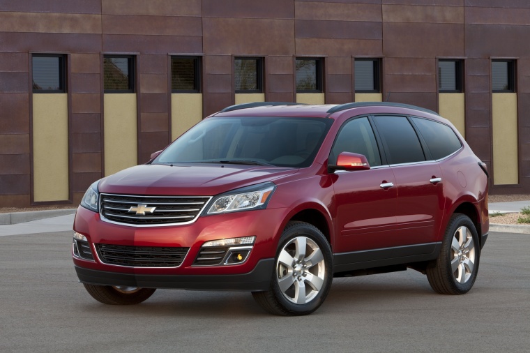 Picture of a 2014 Chevrolet Traverse LTZ AWD in Crystal Red Tintcoat from a front left three-quarter perspective