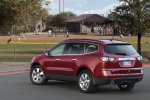 Picture of a 2014 Chevrolet Traverse LTZ AWD in Crystal Red Tintcoat from a rear left three-quarter perspective