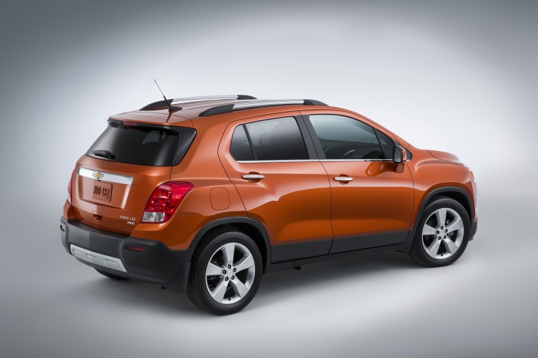 Picture of a 2015 Chevrolet Trax LTZ AWD in Orange Rock Metallic from a rear right three-quarter perspective
