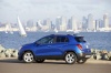 Picture of a 2015 Chevrolet Trax in Brilliant Blue Metallic from a rear left three-quarter perspective