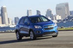 Picture of a driving 2016 Chevrolet Trax in Brilliant Blue Metallic from a front right three-quarter perspective