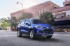 Picture of a driving 2017 Chevrolet Trax Premier in Blue Topaz Metallic from a front right three-quarter perspective