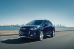 Picture of a driving 2017 Chevrolet Trax Premier in Blue from a front left three-quarter perspective
