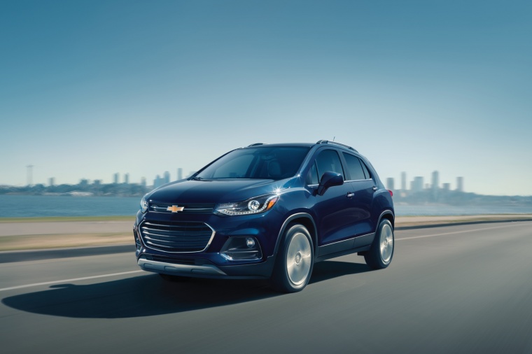Picture of a driving 2018 Chevrolet Trax Premier in Storm Blue Metallic from a front left three-quarter perspective
