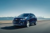 Picture of a driving 2019 Chevrolet Trax Premier in Storm Blue Metallic from a front left three-quarter perspective