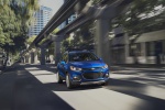 Picture of a driving 2019 Chevrolet Trax Premier in Blue from a front right perspective