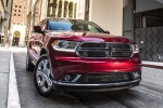 Picture of a 2016 Dodge Durango Limited AWD in Deep Cherry Red Crystal Pearlcoat from a front right perspective