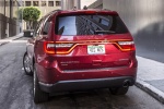 Picture of a 2016 Dodge Durango Limited AWD in Deep Cherry Red Crystal Pearlcoat from a rear left perspective