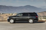 Picture of a driving 2016 Dodge Durango Citadel in Brilliant Black Crystal Pearlcoat from a left side perspective
