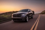 Picture of a driving 2017 Dodge Durango R/T in Maximum Steel Metallic Clearcoat from a front left perspective