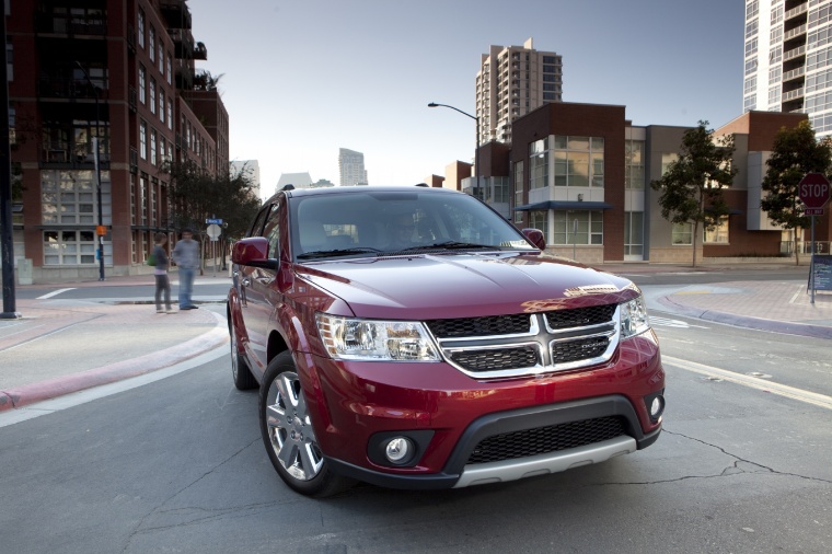 Picture of a 2018 Dodge Journey in Redline 2 Coat Pearl from a front right perspective