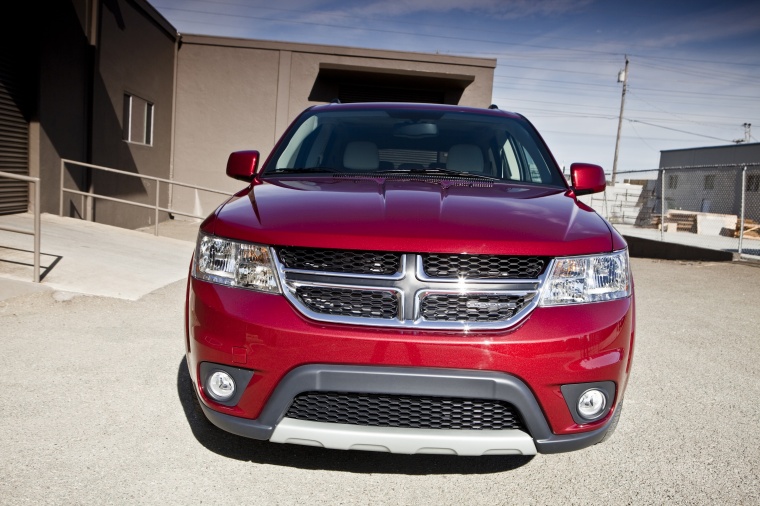 Picture of a 2018 Dodge Journey in Redline 2 Coat Pearl from a frontal perspective