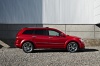 Picture of a 2018 Dodge Journey in Redline 2 Coat Pearl from a right side perspective
