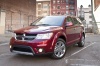 Picture of a 2018 Dodge Journey in Redline 2 Coat Pearl from a front left perspective