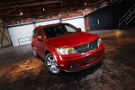 Picture of a 2018 Dodge Journey in Redline 2 Coat Pearl from a front right three-quarter perspective