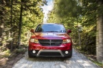 Picture of a driving 2018 Dodge Journey Crossroad AWD in Redline 2 Coat Pearl from a frontal perspective