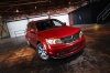 Picture of a 2019 Dodge Journey in Redline 2 Coat Pearl from a front right three-quarter perspective