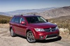Picture of a 2020 Dodge Journey in Redline 2 Coat Pearl from a front right three-quarter perspective