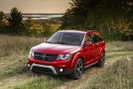 Picture of a 2020 Dodge Journey Crossroad in Redline 2 Coat Pearl from a front left three-quarter perspective
