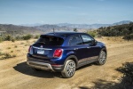 Picture of a driving 2016 Fiat 500X in Blu Venezia from a rear right three-quarter perspective