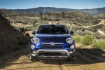 Picture of a driving 2016 Fiat 500X in Blu Venezia from a frontal perspective